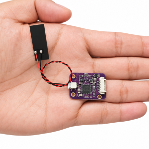 PN7160 MINI V1 I2C module with a connected external antenna shown in a hand